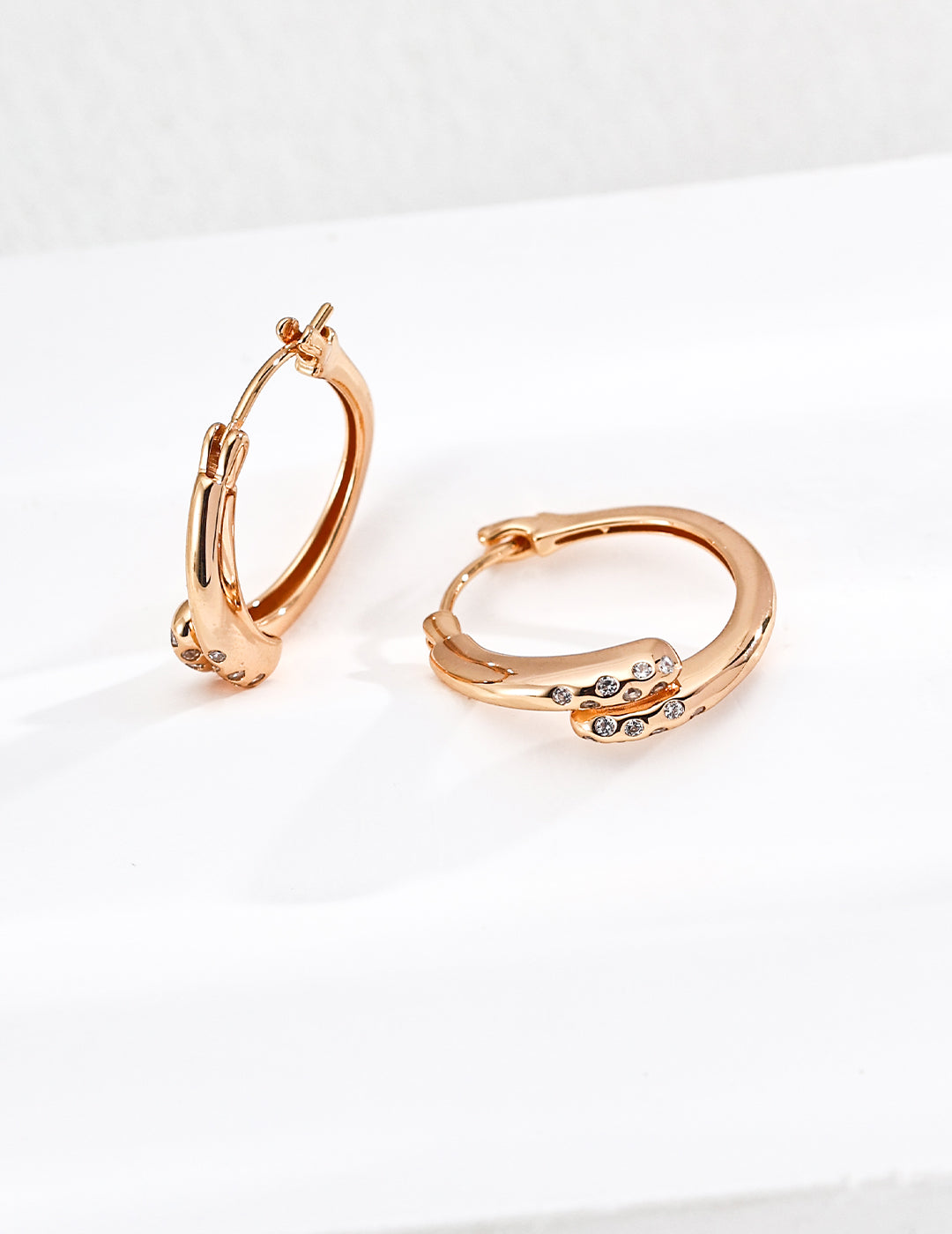 Twisted Gold Hoop Earrings with Diamond Accents