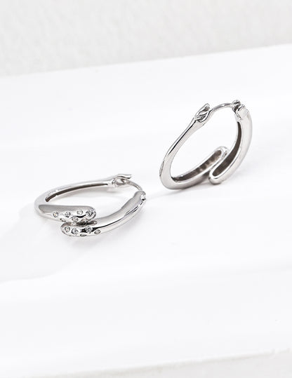 Twisted Gold Hoop Earrings with Diamond Accents