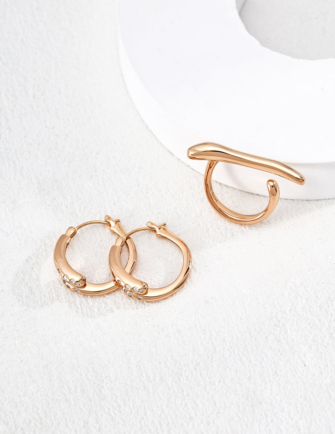 Twisted Gold Hoop Earrings with Diamond Accents