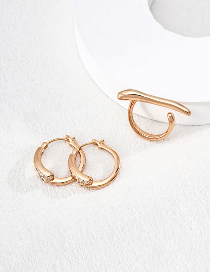 Twisted Gold Hoop Earrings with Diamond Accents