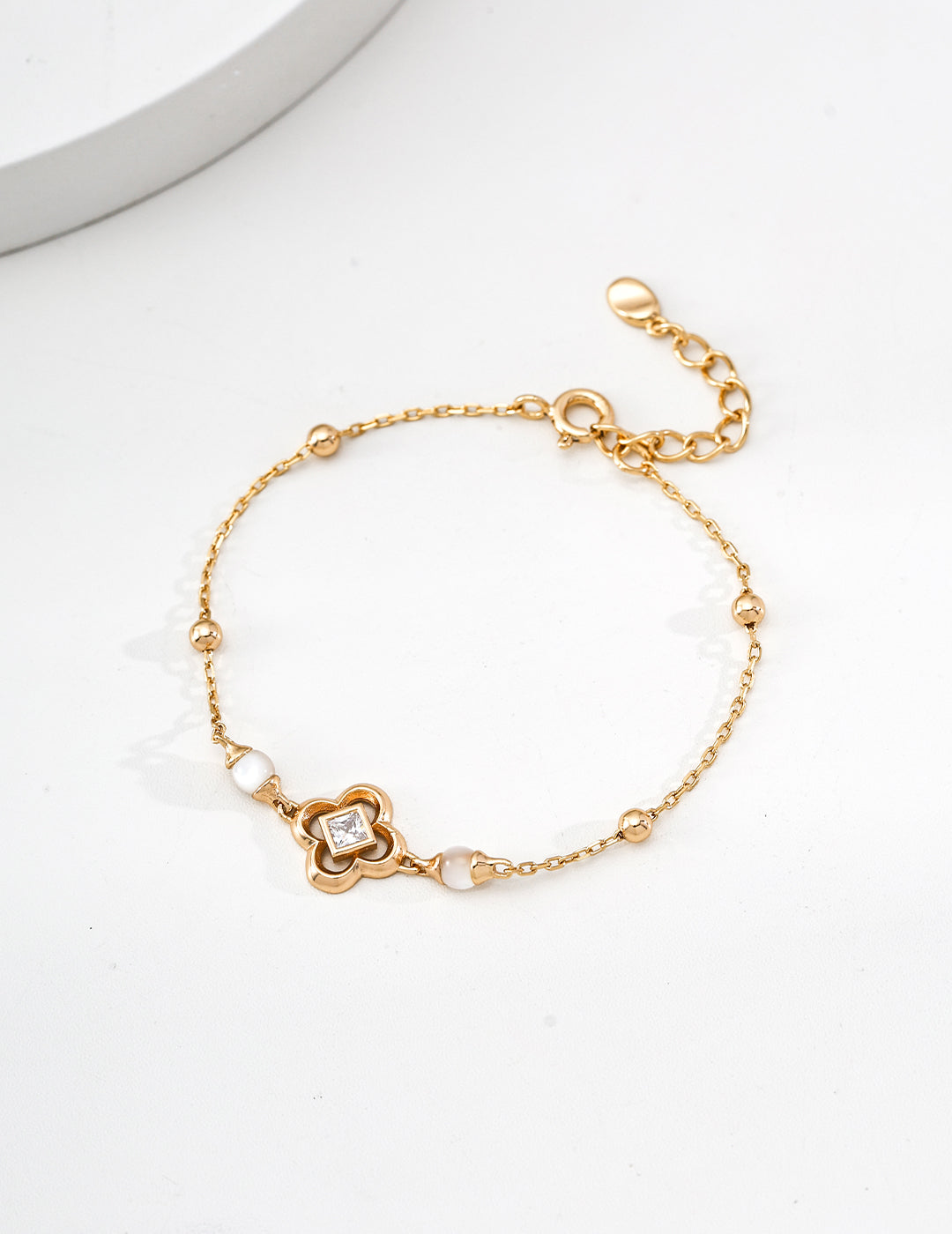 Gold Shell Charm Bracelet with Zircon Accent