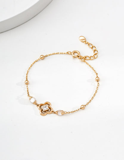 Gold Shell Charm Bracelet with Zircon Accent