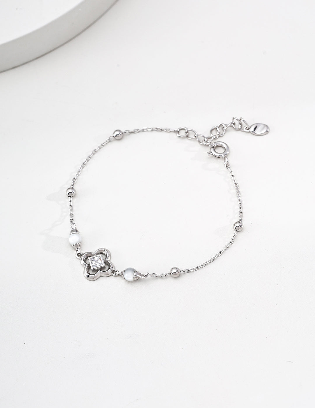 Gold Shell Charm Bracelet with Zircon Accent