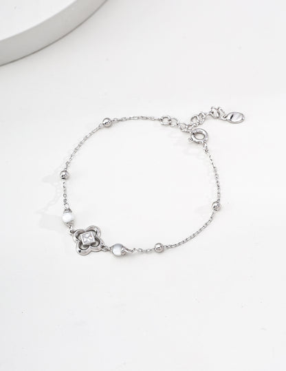 Gold Shell Charm Bracelet with Zircon Accent