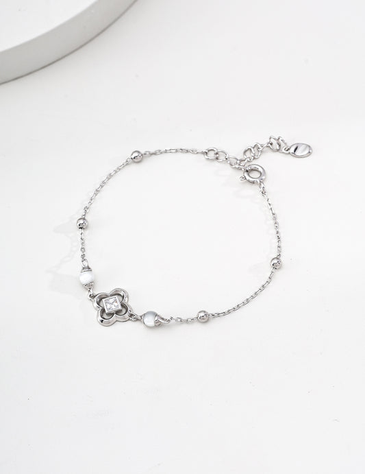Gold Shell Charm Bracelet with Zircon Accent