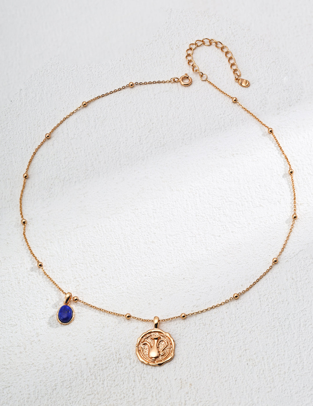 Vintage Gold Coin Necklace with Blue Stone Accent