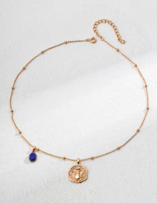 Vintage Gold Coin Necklace with Blue Stone Accent