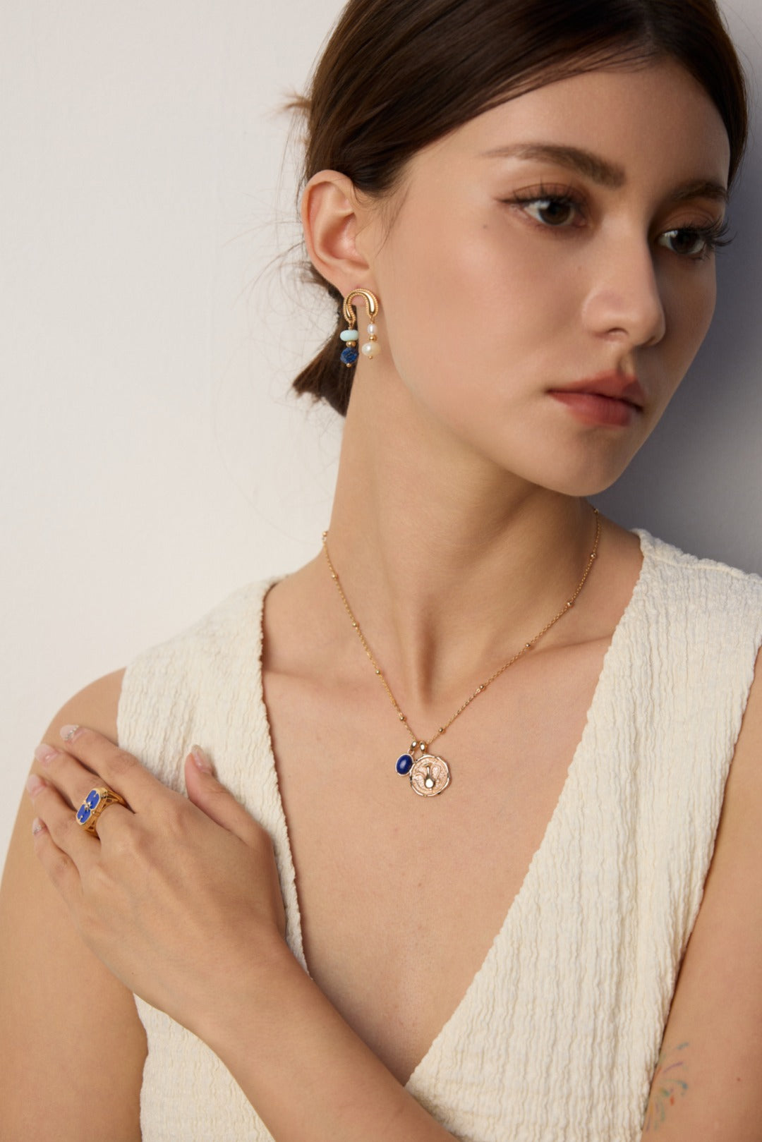 Vintage Gold Coin Necklace with Blue Stone Accent