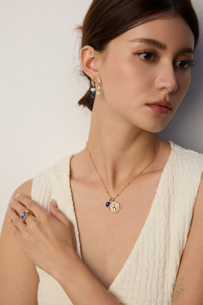 Vintage Gold Coin Necklace with Blue Stone Accent