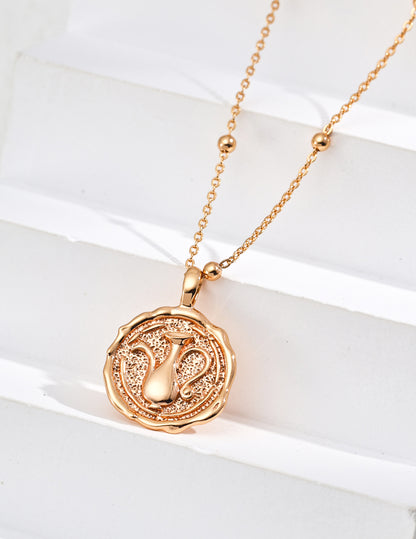 Vintage Gold Coin Necklace with Blue Stone Accent
