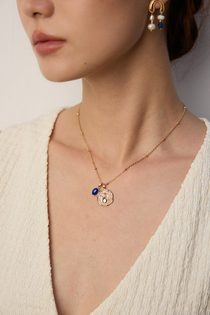 Vintage Gold Coin Necklace with Blue Stone Accent