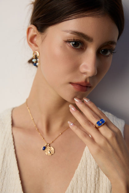 Vintage Gold Coin Necklace with Blue Stone Accent