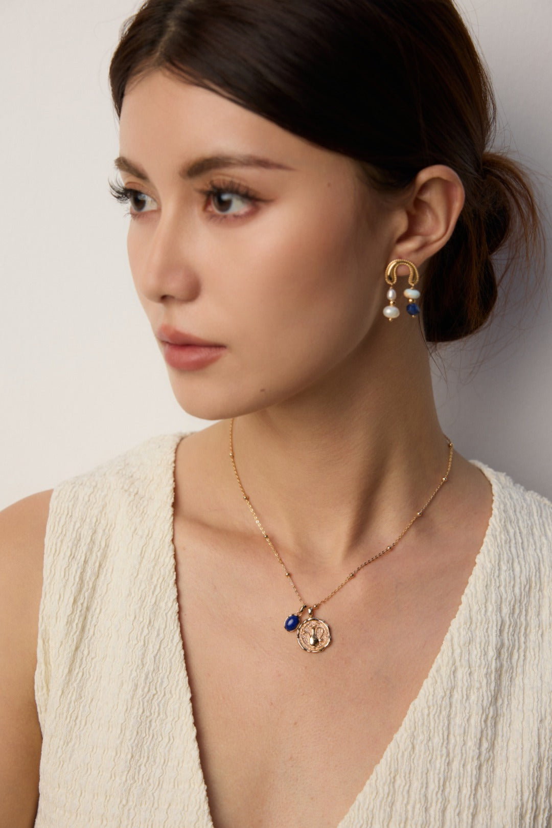 Vintage Gold Coin Necklace with Blue Stone Accent