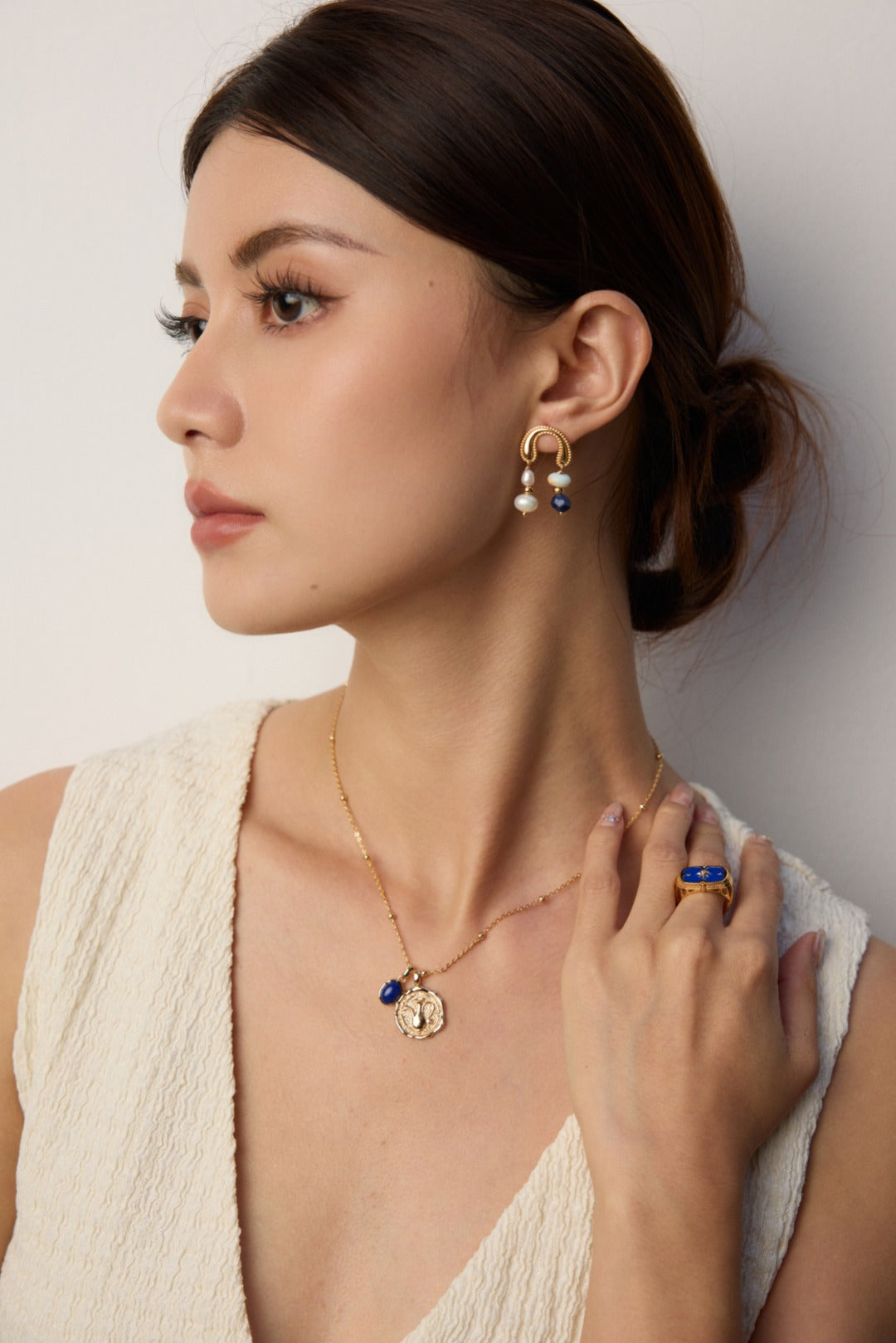 Vintage Gold Coin Necklace with Blue Stone Accent