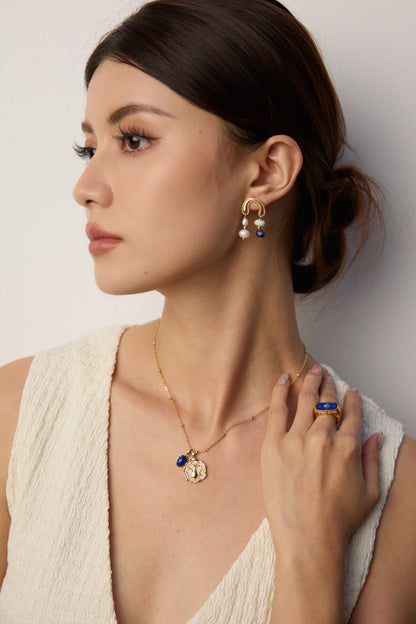 Vintage Gold Coin Necklace with Blue Stone Accent